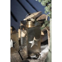 Lanterne med stjerne i dren