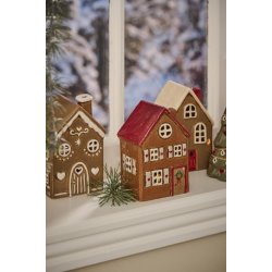 Hus til fyrfadslys med krans p dren Stillenat