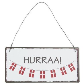 Metalskilt med teksten  Hurraa fra Ib Laursen